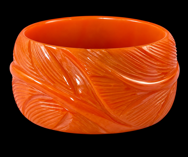 BB147 wide orange leaf carved bakelite bangle